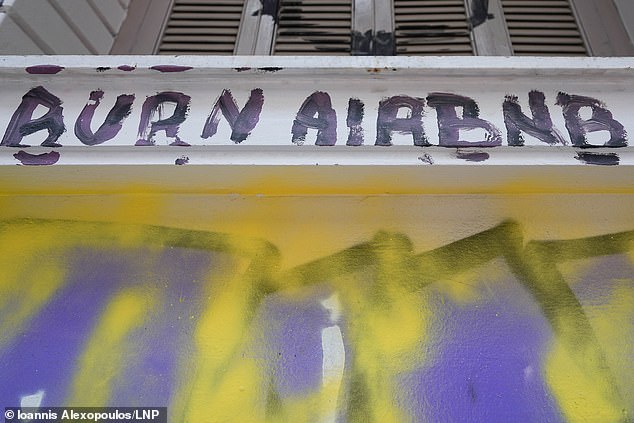 Locals in Athens have been making their feelings about tourists known via chilling graffiti warnings