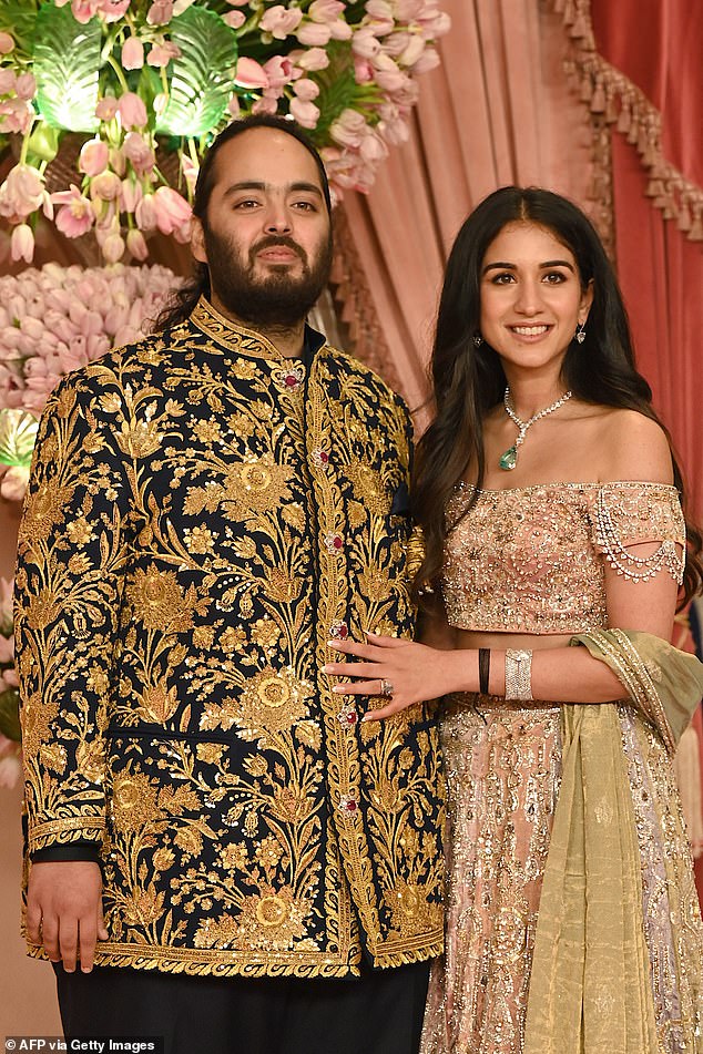 Anant Ambani (left), the son of India¿s richest man, Mukesh Ambani tied the knot with Radhika Merchant (right), the daughter of a wealthy pharmaceutical mogul in a traditional Hindu ceremony in Mumbai this afternoon