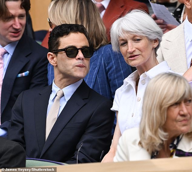 Rami Malek was accompanied by his partner Emma Corrin's mother Juliette in the Royal Box