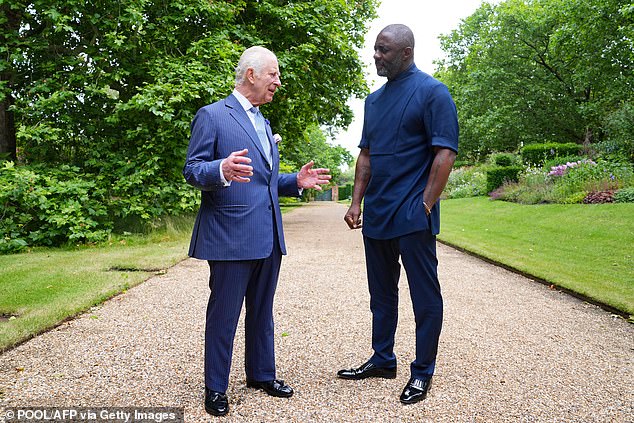 The King and the actor appeared to be in deep conversation as they enjoyed chatting at today's event