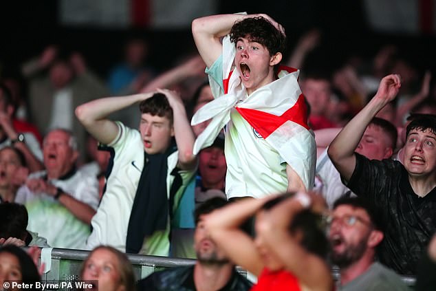 During the game, England fans will be subject to a rollercoaster of emotions and physical changes that they simply can't control. Pictured, fans in Manchester on Wednesday