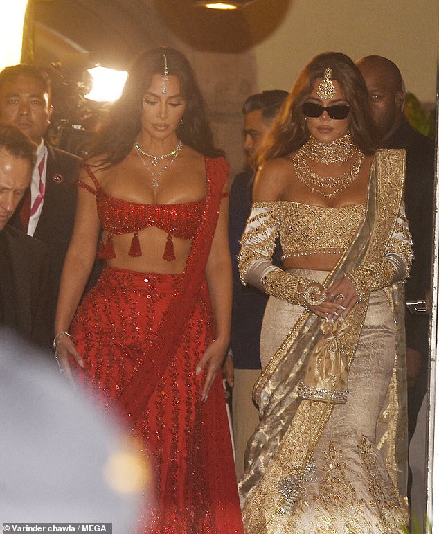 Khloe Kardashian wowed in an intricately beaded cream and gold two-piece with matching sash. Both sisters were spotted leaving from Taj to attend the Anant Ambani grand wedding