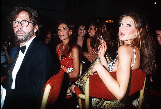 Carla was often photographed smoking long menthol cigarettes for years, but officially gave them up just before giving birth to her and Sarkozy¿s daughter, Giulia, now 12. Pictured with Clapton in 1992