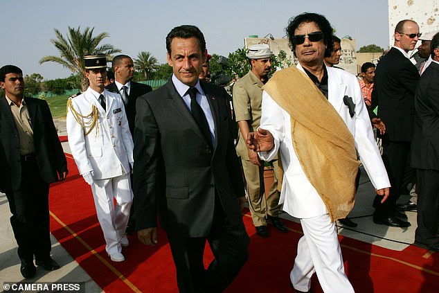 Sarkozy was president when French and British air force jets bombed Libya in 2011. That ended with Gadaffi being hacked to death by a mob of his own subjects. Pictured: Sarkozy and Gadaffi together in 2007