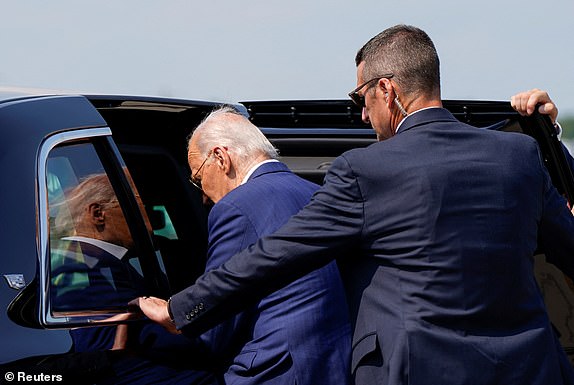 U.S. President Joe Biden enters a vehicle after arriving at Detroit Metropolitan Wayne County Airport in Romulus, Michigan, U.S., July 12, 2024. REUTERS/Elizabeth Frantz