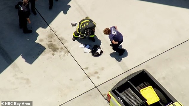 One passenger's bags were pictured on the ground by the taxiway