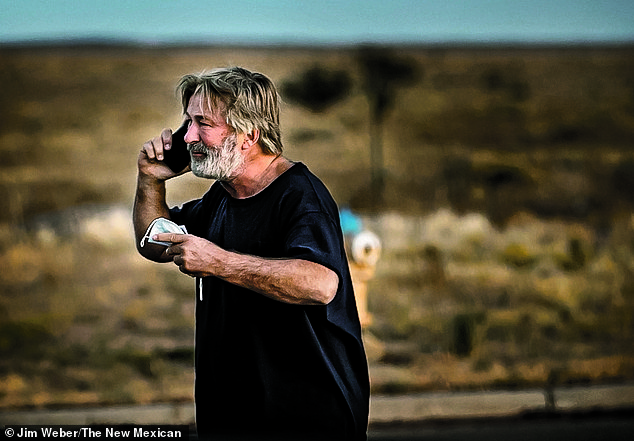 Baldwin, seen here outside the Santa Fe County Sheriff's offices on the day of the shooting,  was had the charges against him brought twice