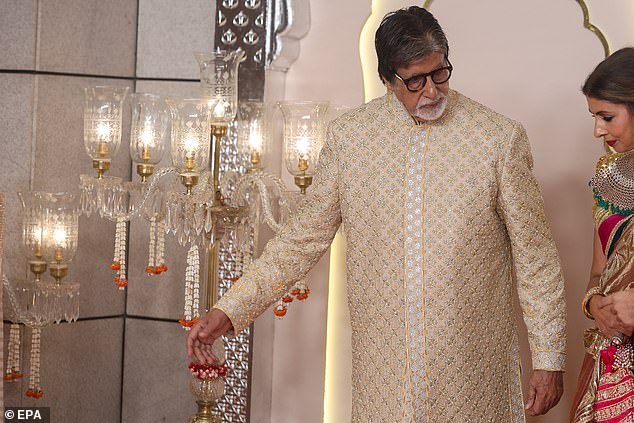 Amitabh Bachchan was also spotted at the wedding donning a glitzy jacket and his statement glasses