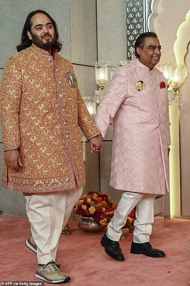 Anant, 29, who is the son of India 's richest man, Mukesh Ambani (seen together today ahead of the wedding), and Radhika, 29, are set to tie the knot this afternoon