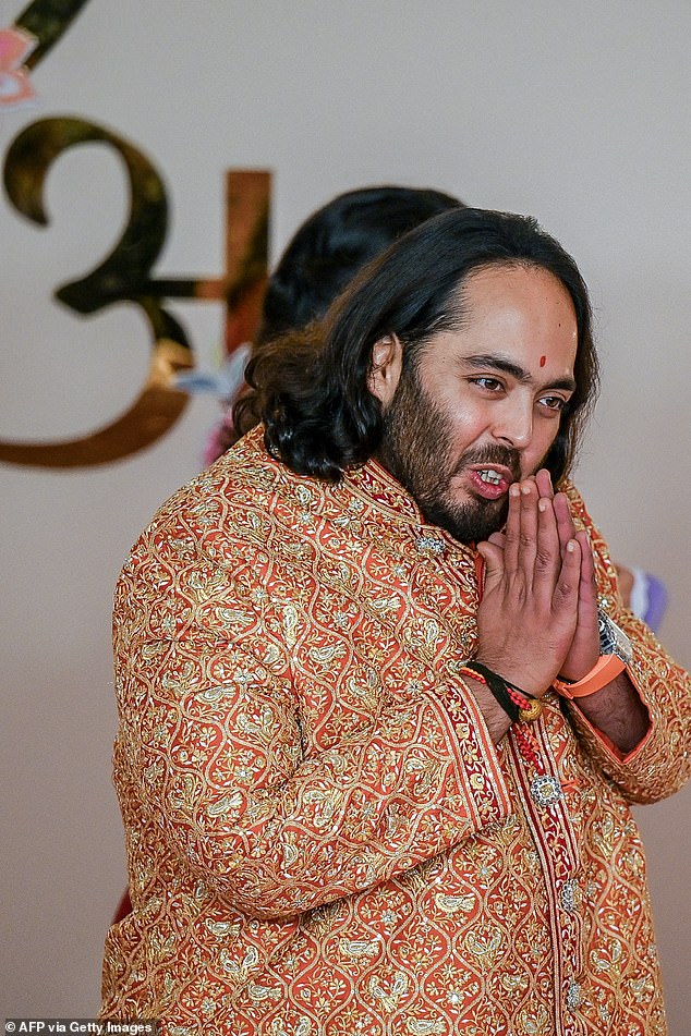 The happy groom arrived at his wedding donning an opulently designed jacket - believed to be called a nehru - along with a pair of crisp white trousers