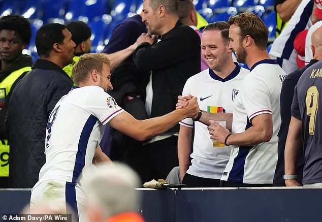 Charlie Kane (right) has been present for several of England Euro 2024 clashes, including the last-16 win over Slovakia (pictured) when his brother scored the winner