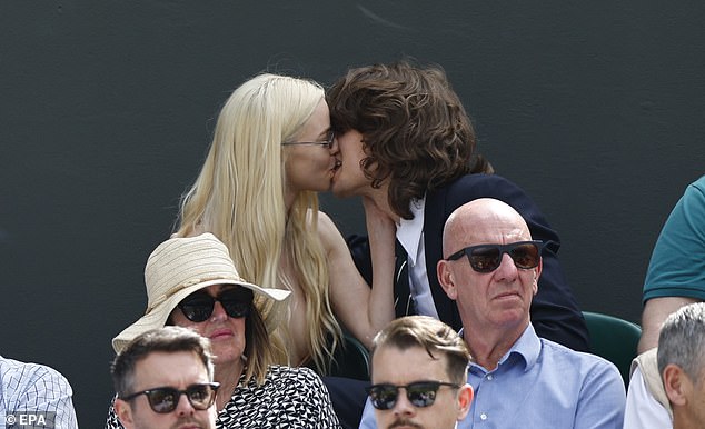 The pair were also spotted sharing a sweet smooch during the intense final match