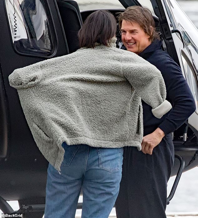 The pair seemed in high spirits after landing in London in Tom's helicopter