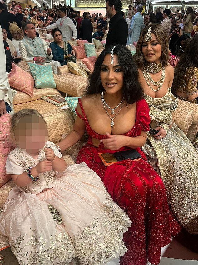 Inside of the lavish wedding celebration, Kim was seen mingling with little Romy Johnson