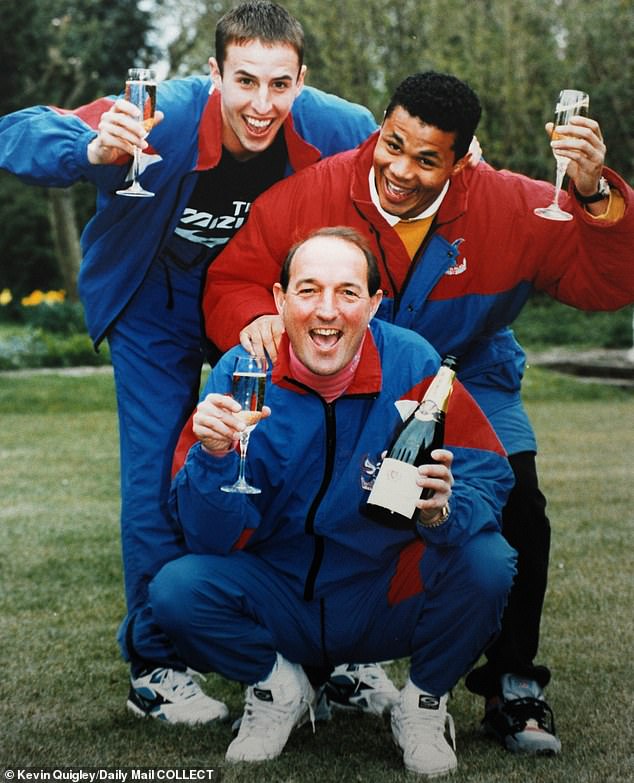 England manager Gareth Southgate (left) and John Salako (right) raise a glass with Crystal Palace boss Alan Smith (centre) on winning promotion to the Premier League back in 1993