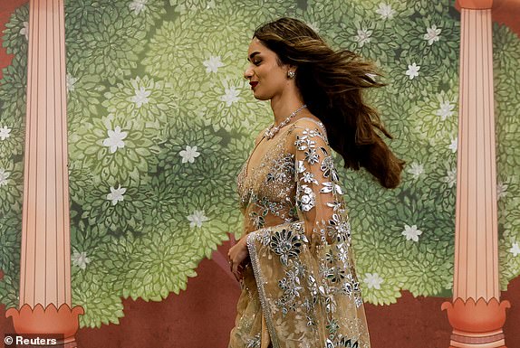 Former Miss World winner Manushi Chhillar poses for pictures on the red carpet as she attends the blessing ceremony of Anant Ambani and Radhika Merchant after their marriage in Mumbai, India, July 13, 2024. REUTERS/Francis Mascarenhas