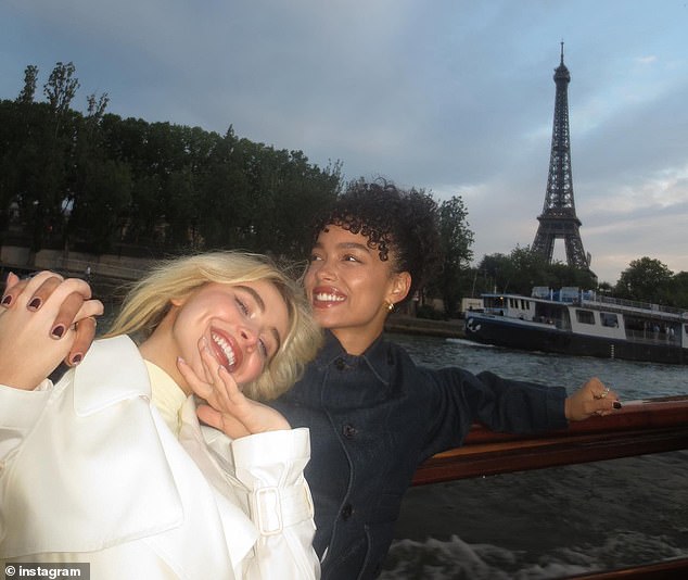 She also snuck in a trip she took to Paris with another pal, the Eiffel Tower looming in the background