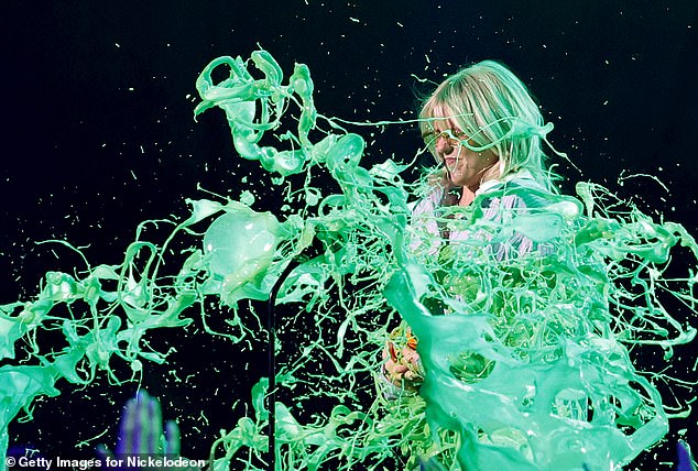 She was seen getting slime thrown into her face while onstage