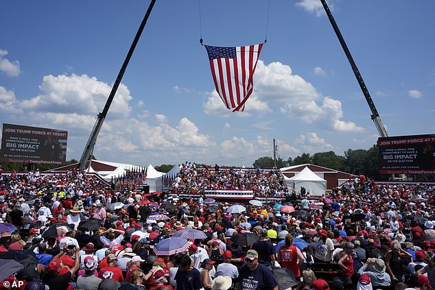 The site of the Trump rally in Butler County Show Grounds is pictured before Trump came on stage. The president spoke on the stage just below the hoisted American flag with a crowd standing behind him.