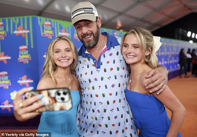 Sandler posed up with twin actresses Mia Allan and Ella Allan, 13