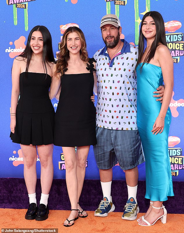 Adam Sandler was a proud husband and father as he walked the 2024 Kids' Choice Awards red carpet with his family on Saturday evening in Los Angeles