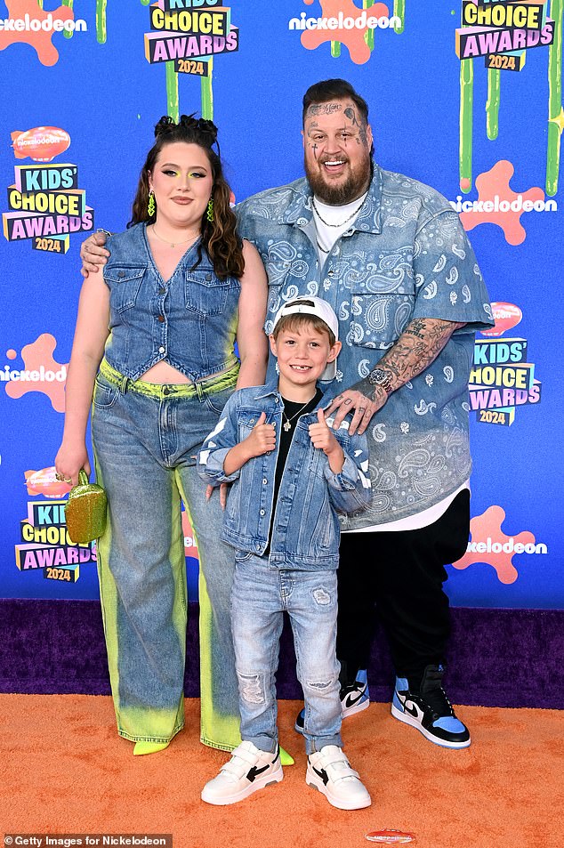 He coordinated with his daughter Bailee Ann, 16, and son Noah Buddy, 8, in denim get-ups for the ceremony on Saturday night