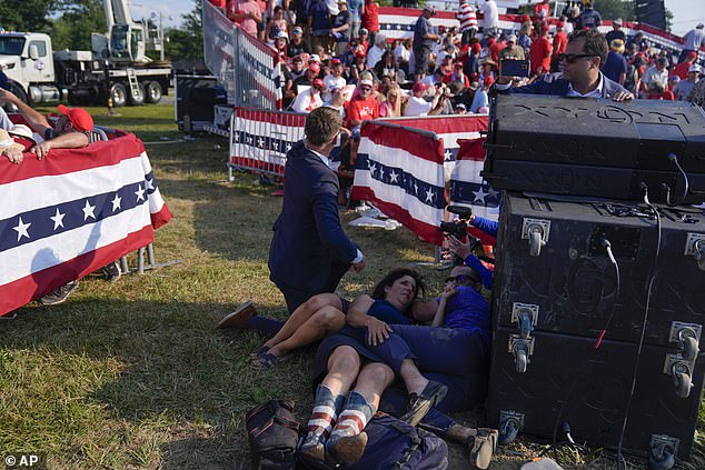 Trump supporters hide as gunfire rings out at the Pennsylvania campaign rally