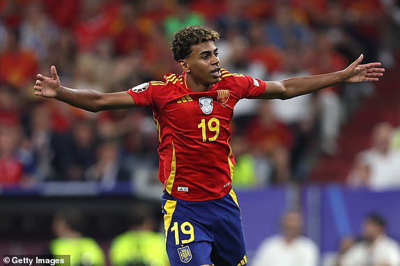 MUNICH, GERMANY - JULY 9: Lamine Yamal of Spain celebration after Spain beat France to reach the UEFA Euro 2024 Final during the UEFA EURO 2024 semi-final match between Spain and France at Munich Football Arena on July 9, 2024 in Munich, Germany. (Photo by Crystal Pix/MB Media/Getty Images)