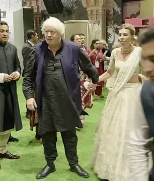 Glamourous Carrie Johnson changed into a second traditional Indian wedding outfit as she her husband Boris and their three children headed to the £250M Ambani wedding in Mumbai this weekend