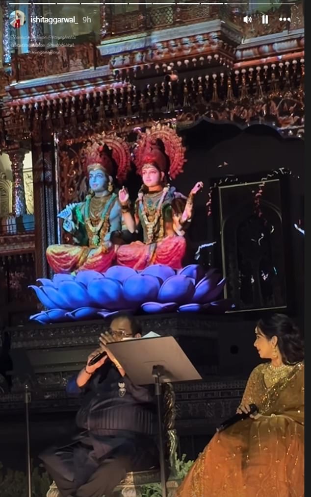 Statues of Hindu gods were on stage while singers performed