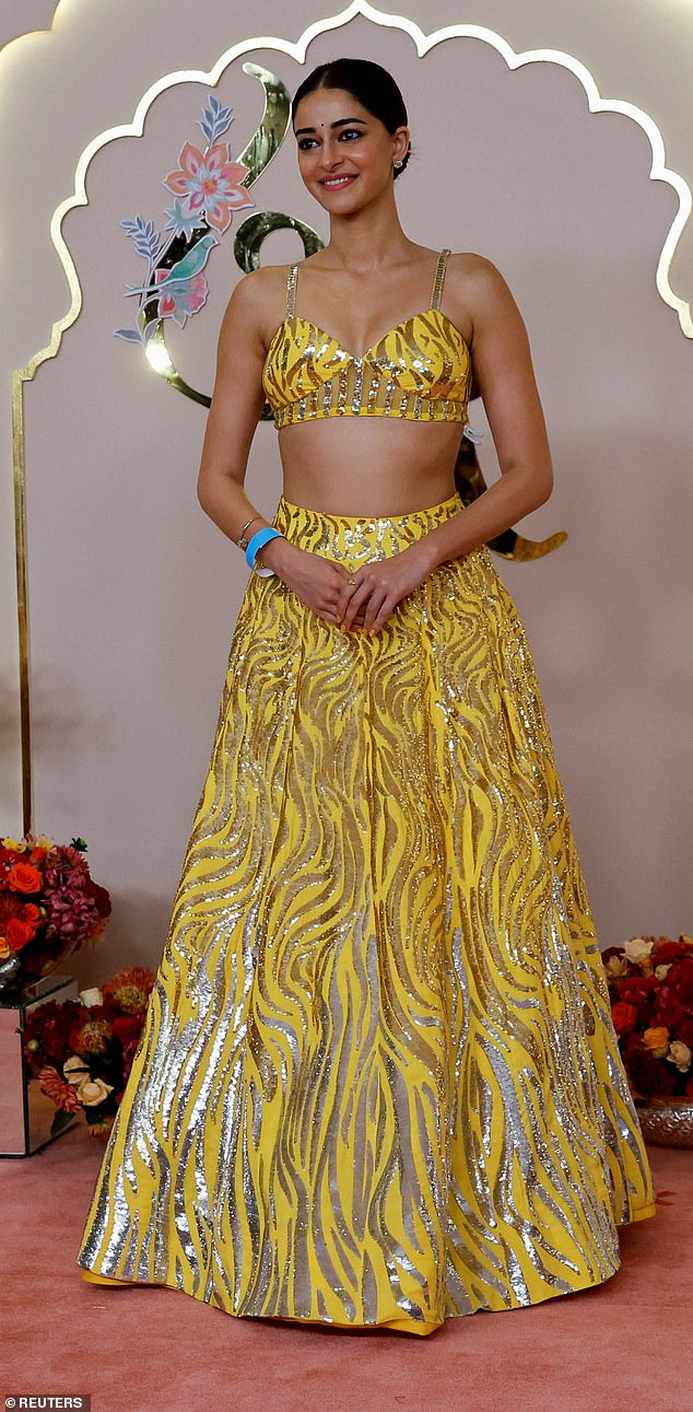 Indian actress and daughter of actor Chunky Panday, Ananya Panday, stuns in an extravagant yellow glitter two-piece