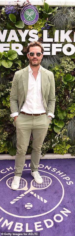 He added a pair of dark shades as he stopped to pose for a few snaps ahead of the hotly-anticipated men's final which will see Novak Djokovic take on reigning champion Carlos Alcaraz