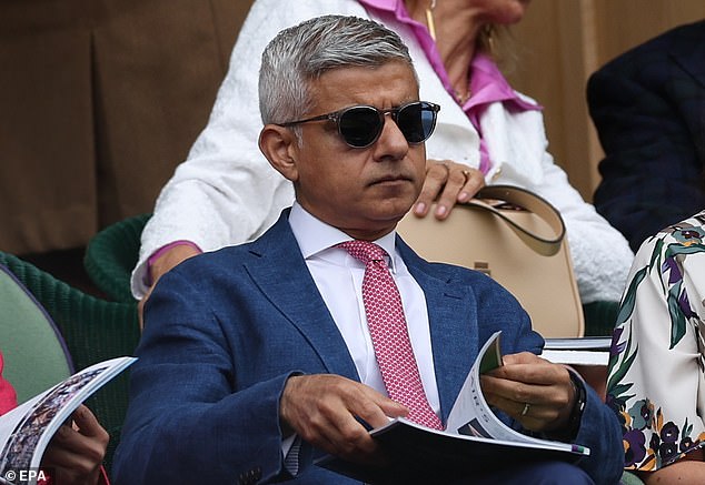 London Mayor Sadiq Khan looking sharp in a blue blazer, red and white patterned tie and shades as he sits in the Royal Box