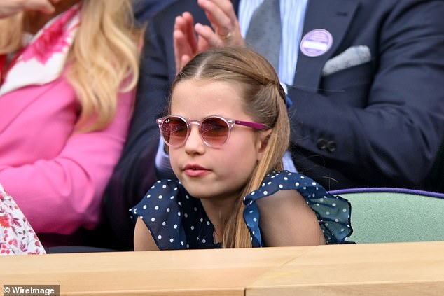 Cool Charlotte looked delighted to be watching the match