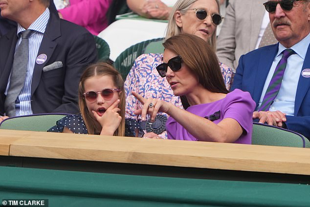 Princess of cool! Charlotte struck a pose as she chatted away to her mother