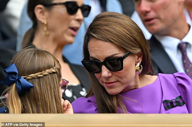 Princess Kate leans in for a chat with her daughter Charlotte in an adorable moment