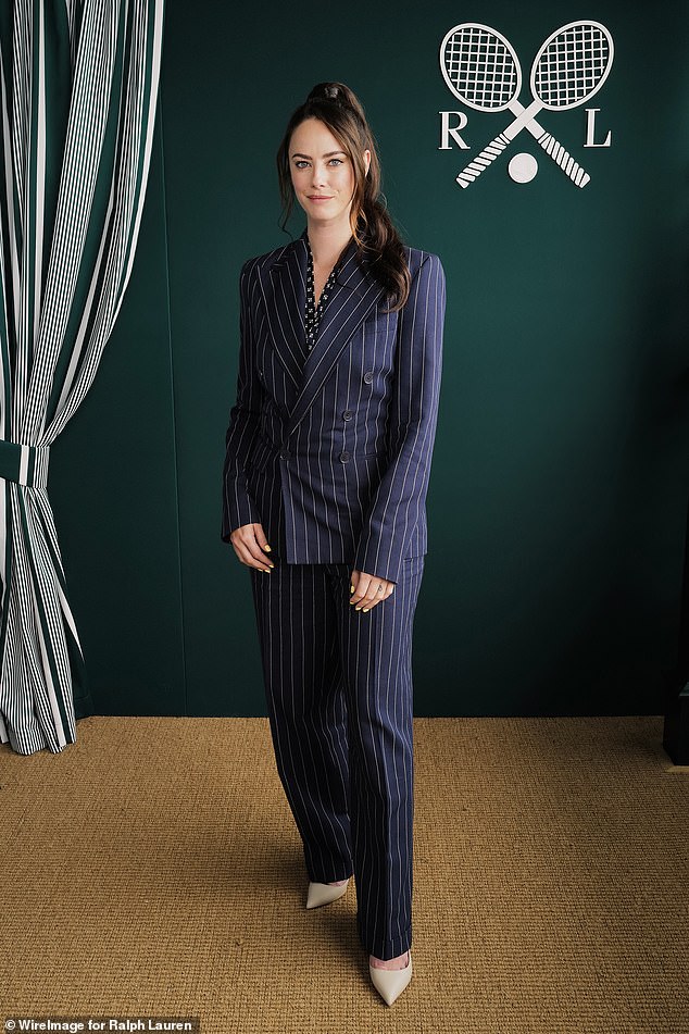 Kaya Scodelario stunned in a navy pinstripe suit