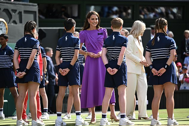 Dressed in a £1295 bespoke dress from Safiyaa, theroyal met with ball boys and girls