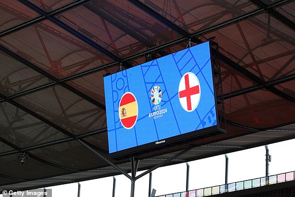 BERLIN, GERMANY - JULY 14: The LED board shows the national flags of Spain and England, and the UEFA EURO 2024 Germany emblem prior to the UEFA EURO 2024 final match between Spain and England at Olympiastadion on July 14, 2024 in Berlin, Germany. (Photo by Richard Pelham/Getty Images)