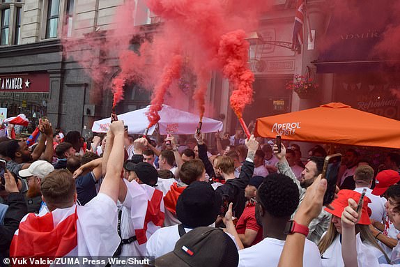 Mandatory Credit: Photo by Vuk Valcic/ZUMA Press Wire/Shutterstock (14586139s) England fans set off smoke flares outside the Admiralty pub in Trafalgar Square in London ahead of the Euro 2024 soccer final with Spain in Berlin. England fans gather in London ahead of the Euro 2024 final with Spain, Uk - 14 Jul 2024