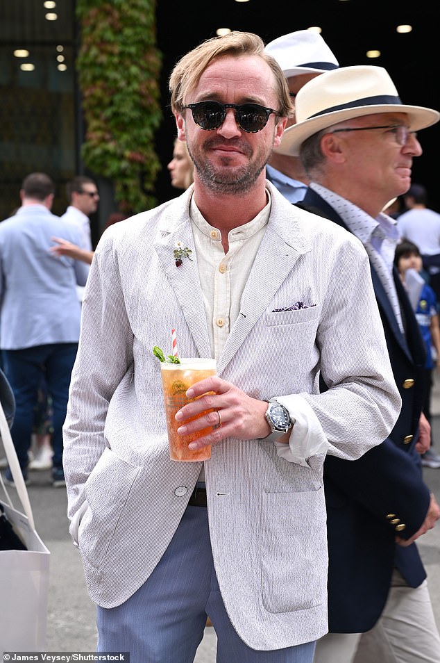 Harry Potter star Tom Felton was seen enjoying a Pimm's