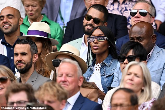 She was later seen watching the action on Centre Court