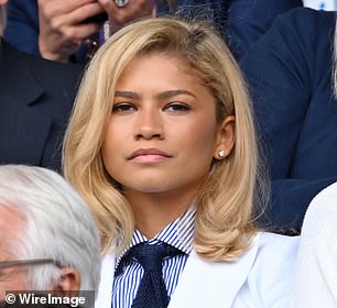 The actress was hard to miss as she watched the action unfold on Centre Court