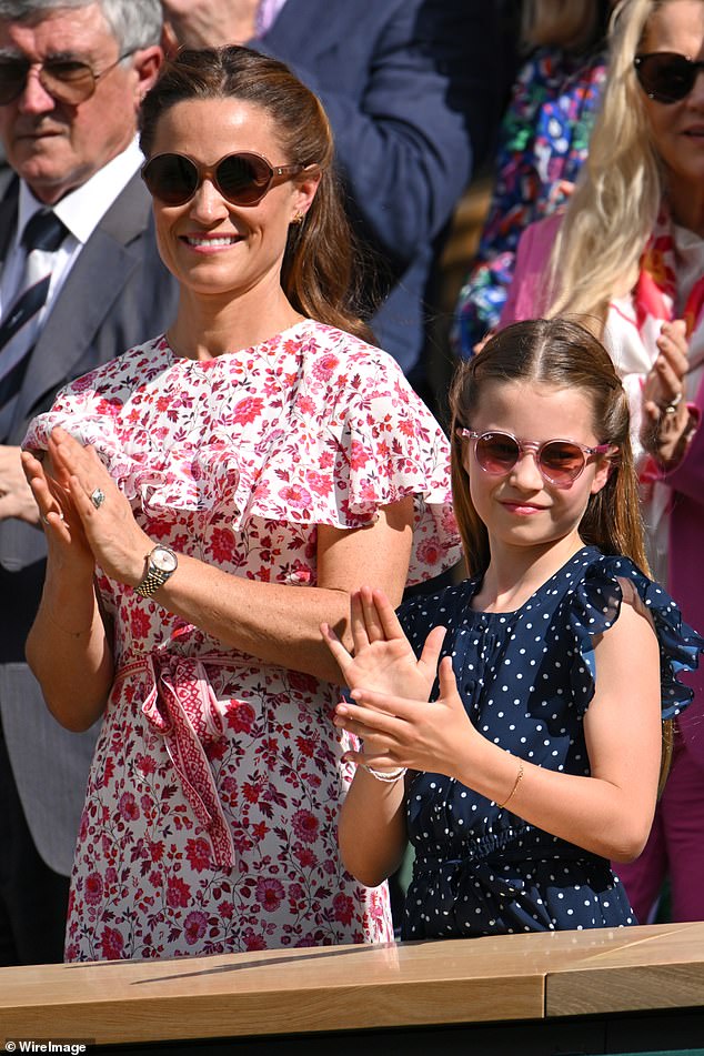 Pictured: Princess Charlotte and her aunt Pippa Middleton seen during a standing ovation for the Wimbledon singles men's finalists today