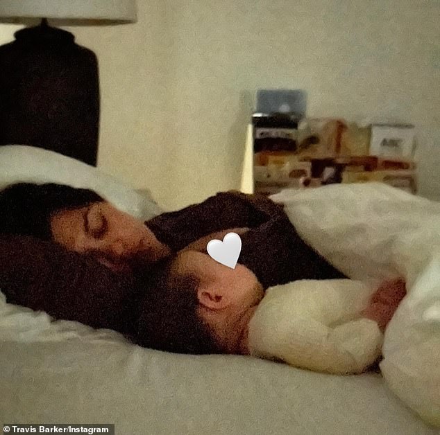 Kardashian and the 48-year-old drummer - collectively known as 'Kravis' - welcomed their first child together, son Rocky Thirteen Barker, on November 1 (pictured May 12)