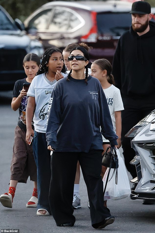 Kourtney Kardashian Barker (M) treated her 12-year-old daughter Penelope Scotland Disick (L), 11-year-old niece North West (2-L), and two of their little gal pals to dinner at their family-favorite sushi restaurant Shibuya in Calabasas on Saturday