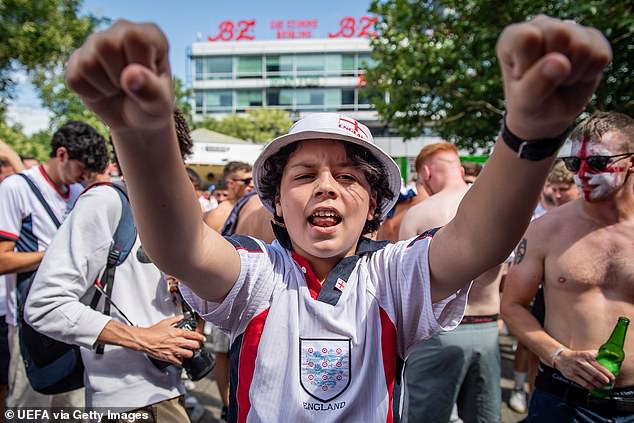 A young England fan having fun before the game tonight