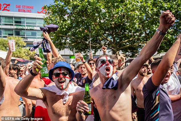 English fans having fun at England Fan Zone at Breitscheidplatz before the final