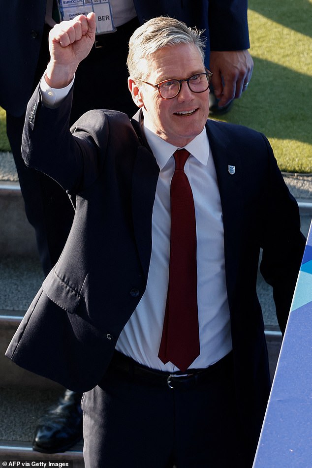 Britain's Prime Minister Keir Starmer waves as he arrives for the UEFA Euro 2024 final