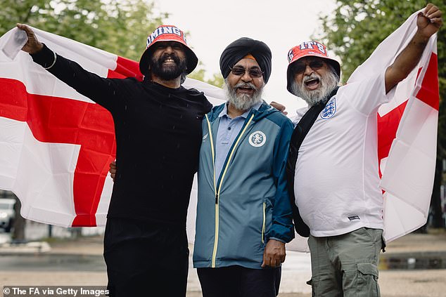 England fans gather ahead of the UEFA Euro 2024 Football Championship final with bucket hats which read 'It's Coming Home'